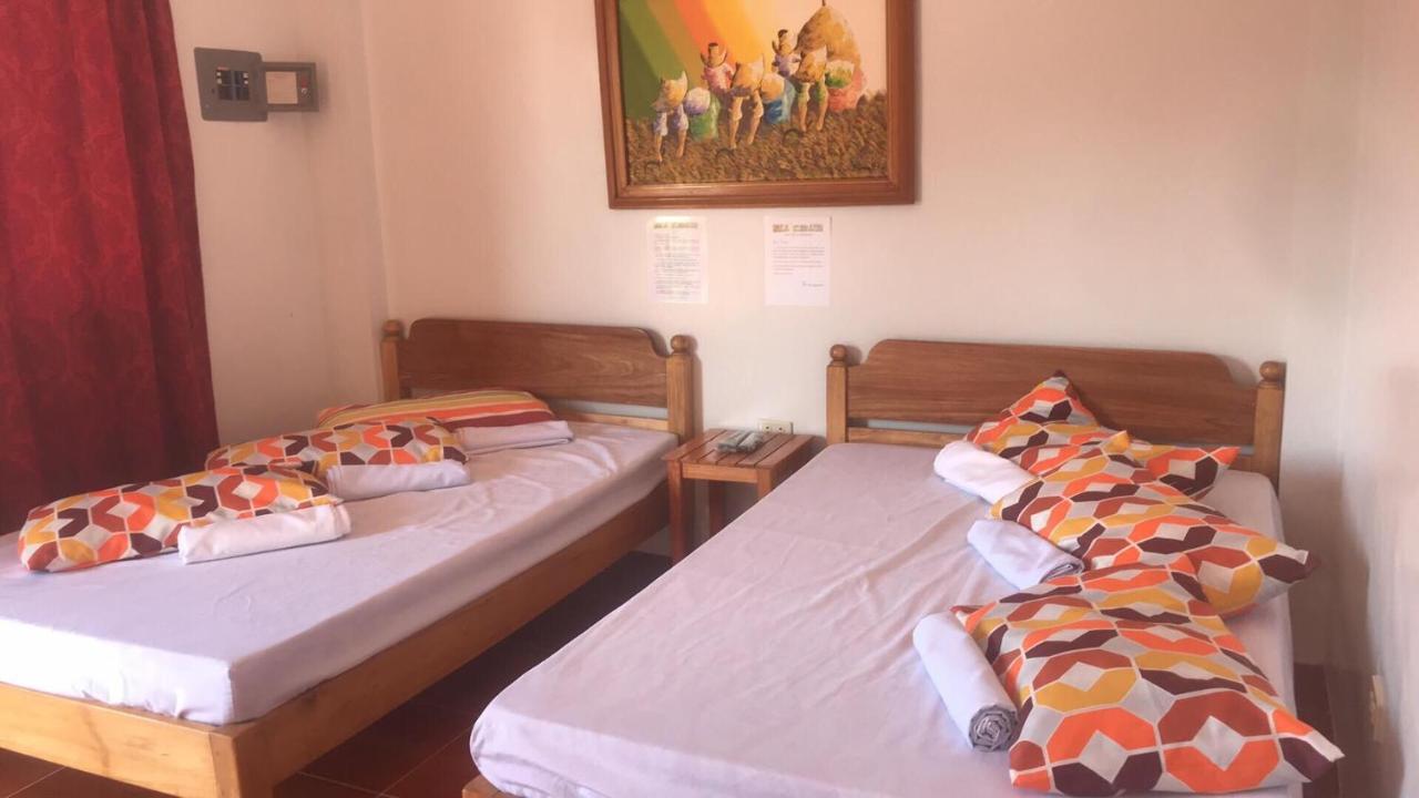 Lotus Sun & Waves Beach Resort Baler Buitenkant foto