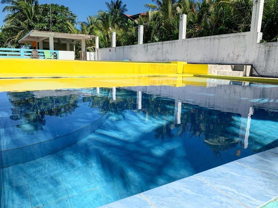 Lotus Sun & Waves Beach Resort Baler Buitenkant foto