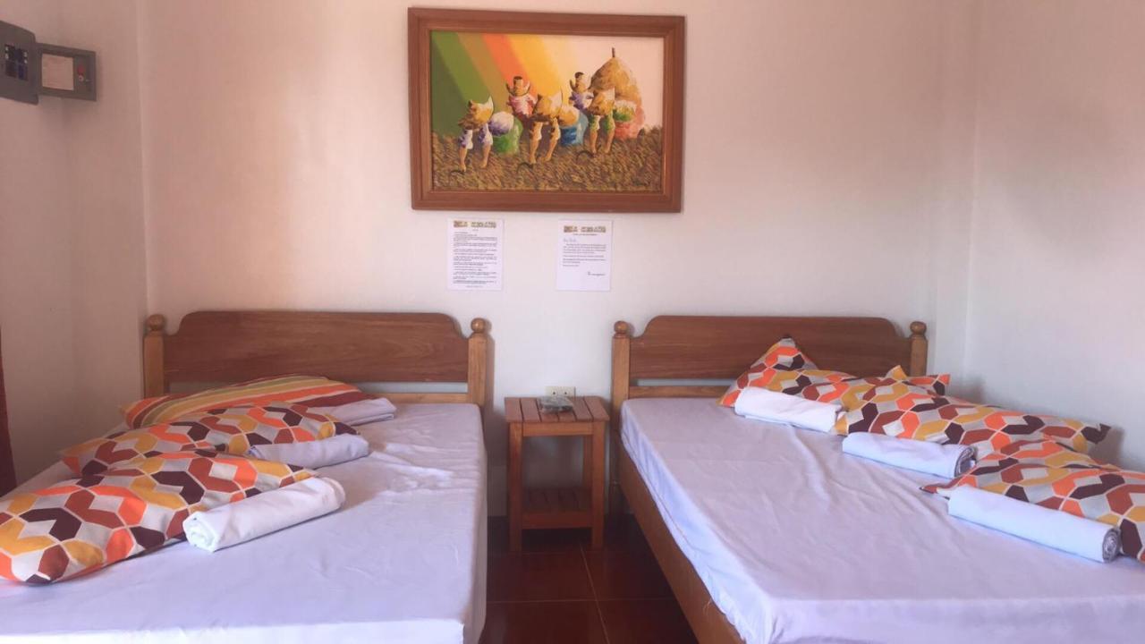 Lotus Sun & Waves Beach Resort Baler Buitenkant foto
